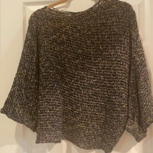 Free people size small crochet multicolor sweater with a poncho like feel.